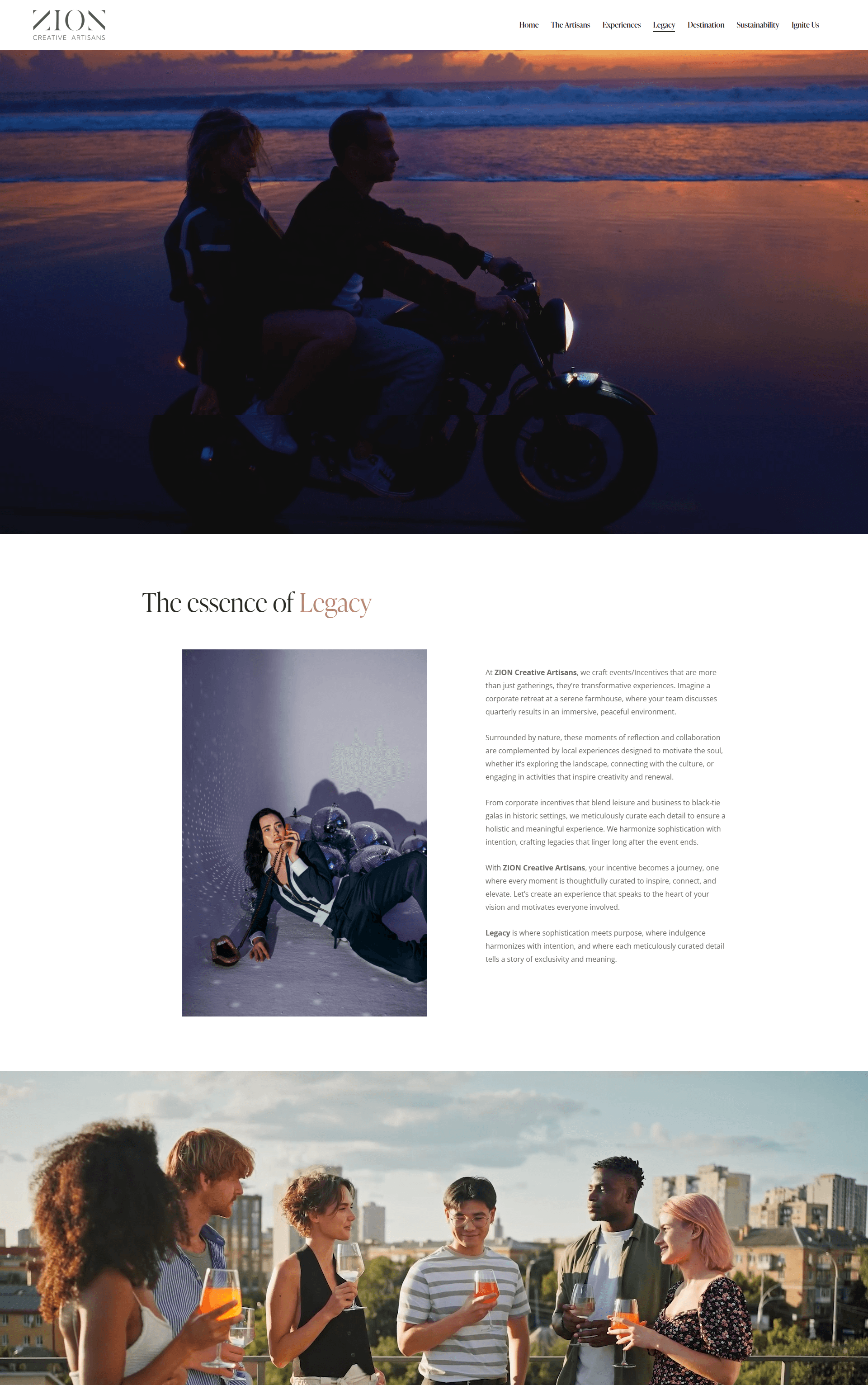 Couple on a motorcycle at dusk by the coast